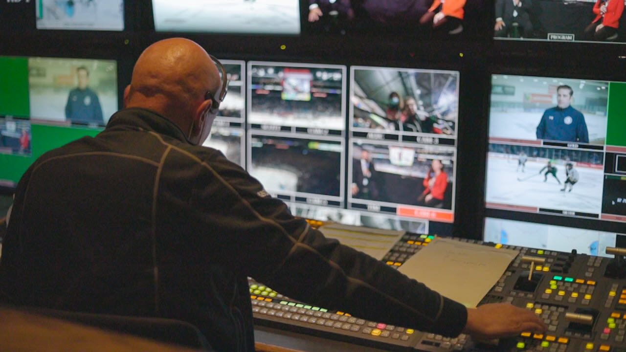 Volunteer operates TV camera